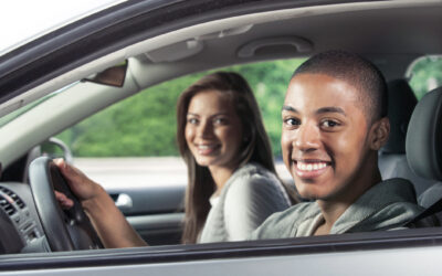 Teenagers driving car