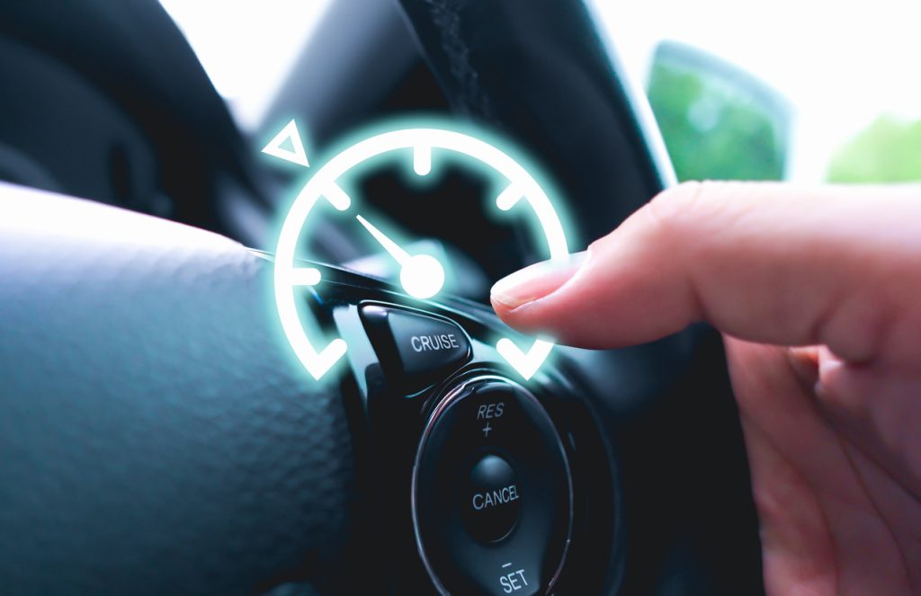 Automotive cruise control system on the steering wheel